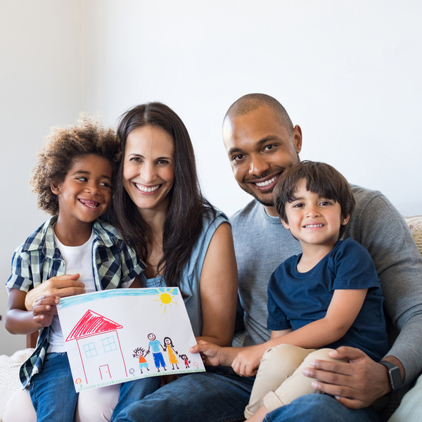 Family Dentistry Family of 4 with a Drawing