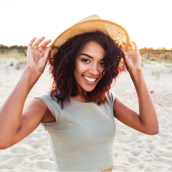 Cosmetic Dentistry Young Woman at Beach