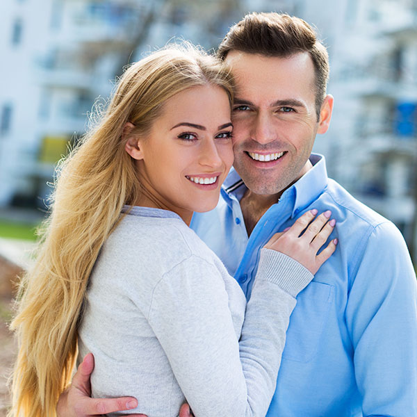 Sterilization Couple Hugging Outdoors